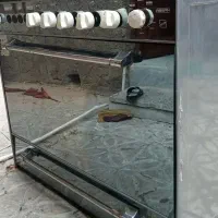 اجاق گاز فر دار پنج شعله وکامپیوتر رو میزی