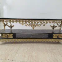 میز تلویزیون و ساعت برنز