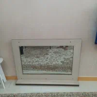 اینه دیواری تاخچه دار