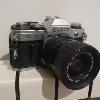 Canon AE-1 با لنز زوم