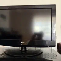 تلویزیون ۲۶ ال‌جی با میز  ترک