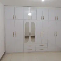 ساخت انواع کمد کابینت ودرب چوبی
