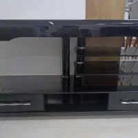 میز تلویزیون شیشه ای در حد نو
