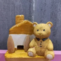 جا عودی  و دکوری با مجسمه خرسی چوبی