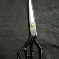 قیچی و دستگاه دکمه پرچ