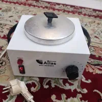 دستگاه وکس یا موم گرم کن