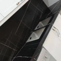 اجرای کانترتاپ سنگ طبیعی کوارتز کورین سرامیک ال جی