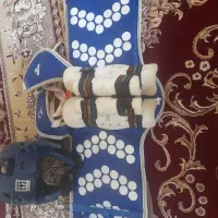 وسایل تکواندو و کفش کشتی