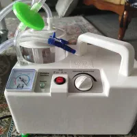 دستگاه ساکشن و اکسیمتر