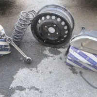 لوازم پراید چراغ جلو طبق کمک فنر