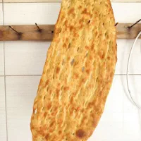 پاچالدار یا فروشنده نان برای نانوایی