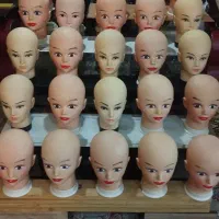 تعدادی مانکن سر مناسب شال وکلاه و تعدادی رگال