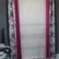 پرده مناسب پذیرایی با پارچه‌ای کناری