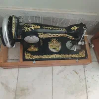 پرده وچرخ خیاطی