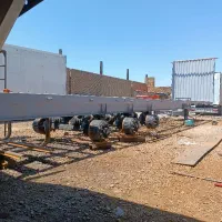 همکاری در کارگاه کانتینر سازی