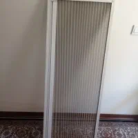 دوتاپنجره دوجداره بدون شیشه با توری پلیسه ای
