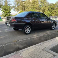 پژو عنابی رنگ خاص