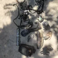 لوازم پژو ۲۰۰۰ اگزوز بلوچی   کاربرات کیلومتر