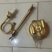 دیوار کوب‌ برنج‌ و برنز