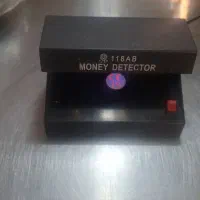دستگاه تشخیص پول تقلبی