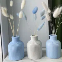هدیه گل مصنوعی و شمع و سنگ مصنوعی