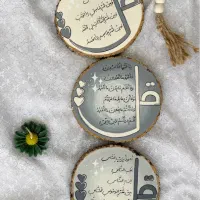 دیوارکوب سفالی و آویز چوبی