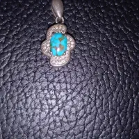 دستبند و اویز نقره هردو استفاده نشده