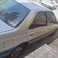 پژو 405 نقره ای تکسوز
