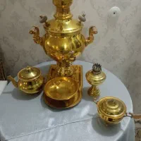سماور برنزمهردار و میز خاطره و ‌سایلاش  کلا 10تیکه