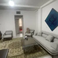 مبل نیم ست طوسی مینیمال و میز با شیشه