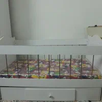 تخت خواب کودک تا ۷سال وکالسکه در حد