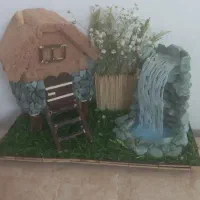 ماکت کلبه و آبشار