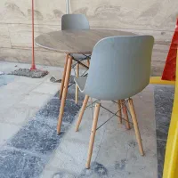 میز گرد چوب و دو عدد صندلی