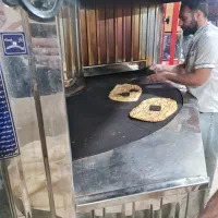 به یک شاگرد جهت کار در نونوایی