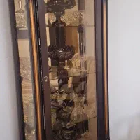 ویترین دکوری چراغ دار پشت اینه