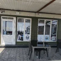 فرکار فست فود و وسط کار هایپرمارکت و صندوقدار