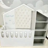تخت کودک چندکاره باخوشخواب یک تخت باکمد ویترین