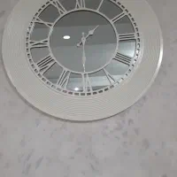 ساعت دیواری آینه‌ای طرح رومی