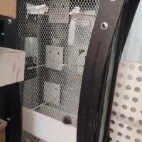 قفس پرنده بوفه جای لونه وکف باورق درست شده