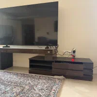 میز زیر تلویزیون چوبی با قابلیت تنظیم عرض