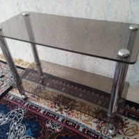 میز شیشه ای چرخ دار