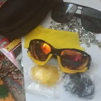 عینک دودی یکی مارک پورشه دیزاین و یکی اوکلی