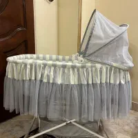 گهواره تخت کنار مادر
