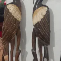 مجسمه چوبی لک لک