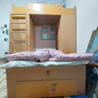 تخت خواب دو طبقه با کمد وکتابخانه ومیز تحریر