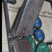 دمبل بدنسازی ۱۵ کیلویی و میز پرس