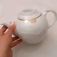 قوری و کاسه ماست