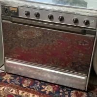 اجاق گاز فر دار تاکنو سالم با دو جوجه گردان