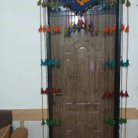 پرده آویز کاموایی