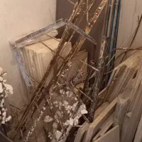 نبشی و میلگرد باقی مانده از تخریب